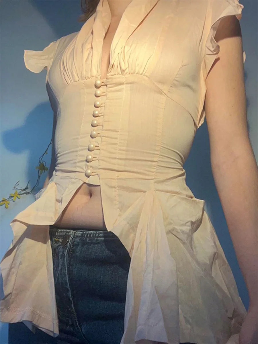 Elegant Sleeveless Ruffle Blouse
